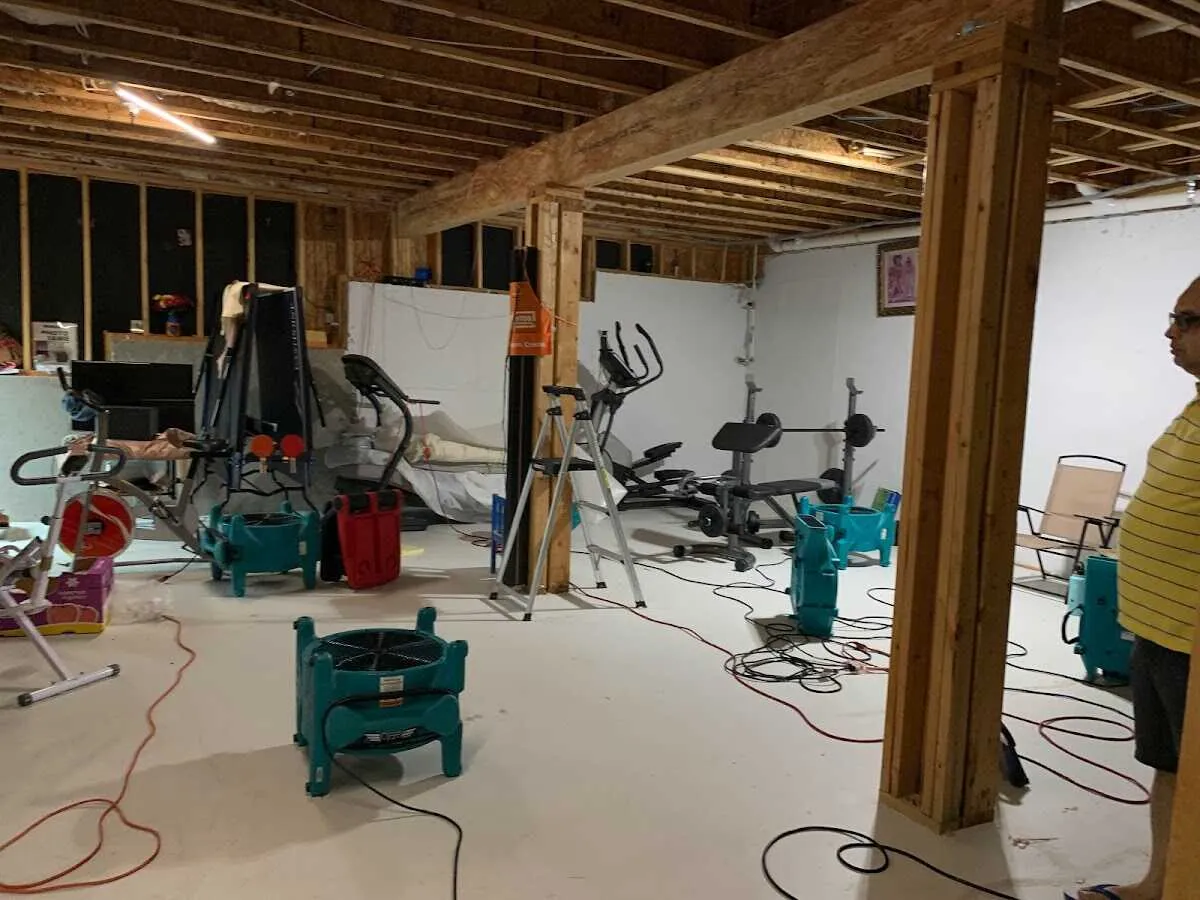 Basement drying equipment setup for Contents Cleaning & Restoration in Harrah